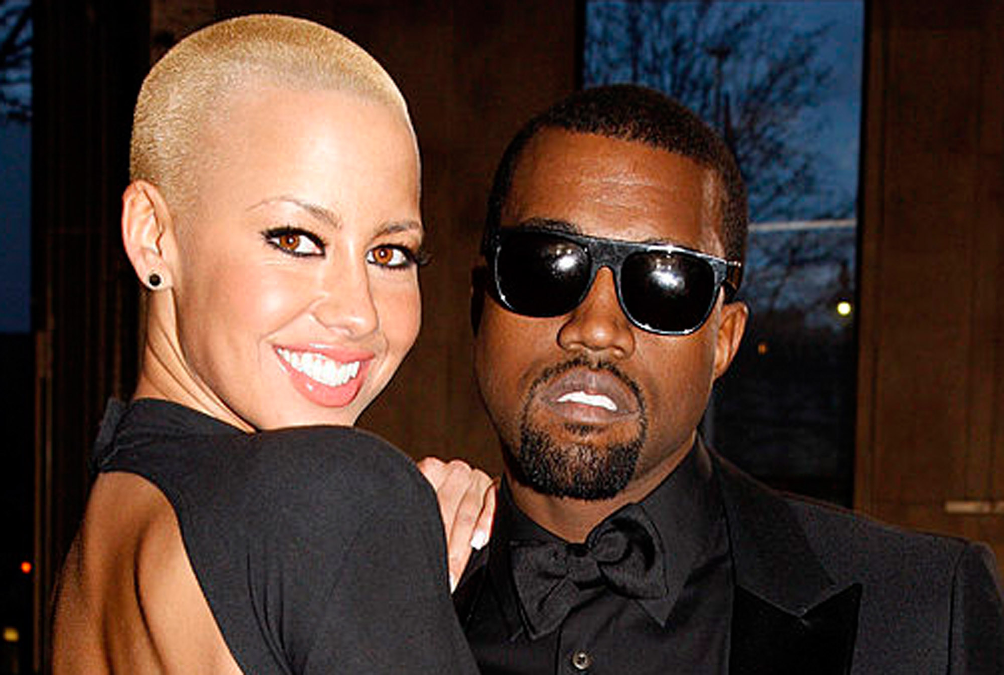 Amber Rose og Kanye West på Yves Saint Laurent-show under Paris Fashion Week i 2009 (Michel Dufour/WireImage)