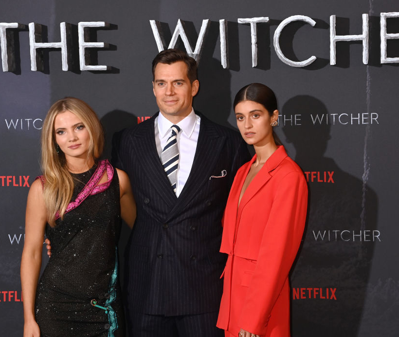 LONDON, ENGLAND - DECEMBER 01: Freya Allan, Henry Cavill and Anya Chalotra attend the World Premiere of "The Witcher: Season 2" at Odeon Luxe Leicester Square on December 01, 2021 in London, England. (Photo by Dave J Hogan/Getty Images)