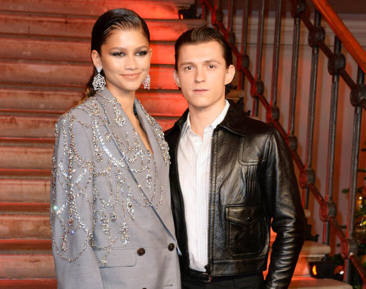 LONDON, ENGLAND - DECEMBER 05: Zendaya and Tom Holland pose at a photocall for "Spider-Man: No Way Home" at The Old Sessions House on December 5, 2021 in London, England. (Photo by David M. Benett/Dave Benett/WireImage)