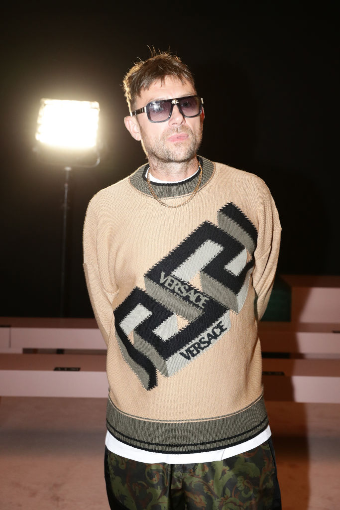 MILAN, ITALY - SEPTEMBER 24: Damon Albarn is seen on the front row of the Versace fashion show during the Milan Fashion Week - Spring / Summer 2022 on September 24, 2021 in Milan, Italy. (Photo by Vittorio Zunino Celotto/Getty Images)